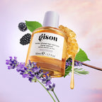 Hair perfume 50 ml bottle surrounded by lavender and berries.