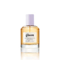Gisou Honey Infused Hair Perfume in a 50ml bottle with a lavender cap, filled with golden honey‑toned fragrance.