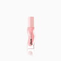 Light pink shimmer lip oil.