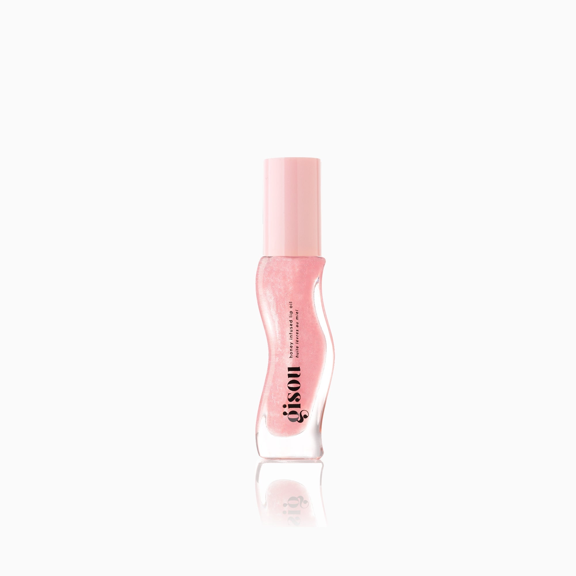 Light pink shimmer lip oil.