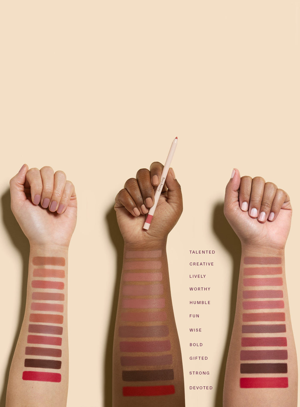 All shades of Rare Beauty's Kind Words Matte Lip Liner swatched on three arms of varying skin tones.