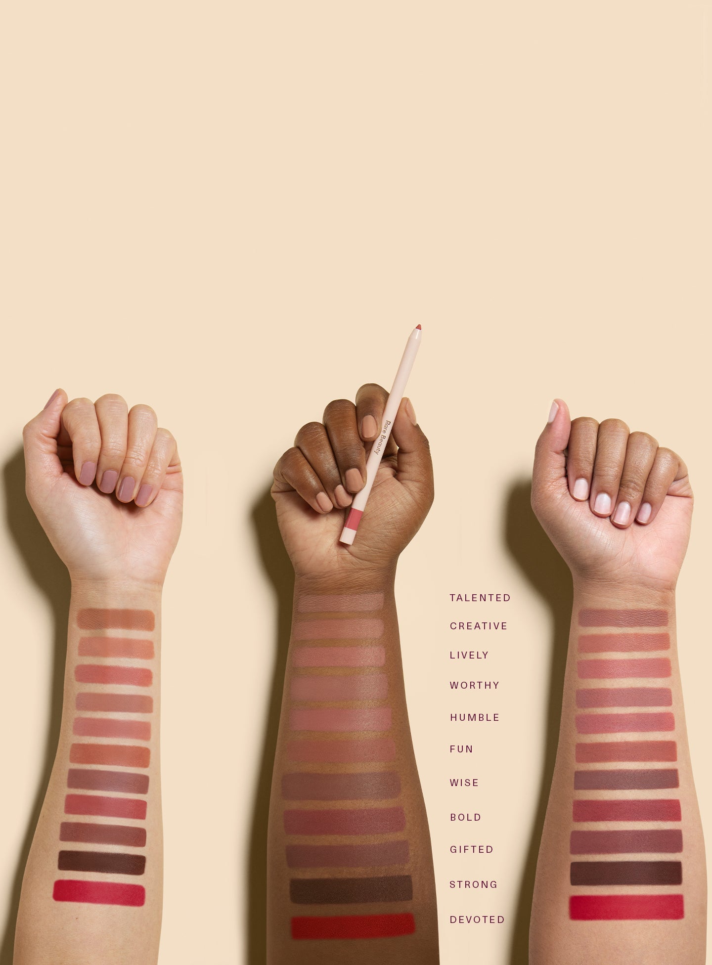 All shades of Rare Beauty's Kind Words Matte Lip Liner swatched on three arms of varying skin tones.