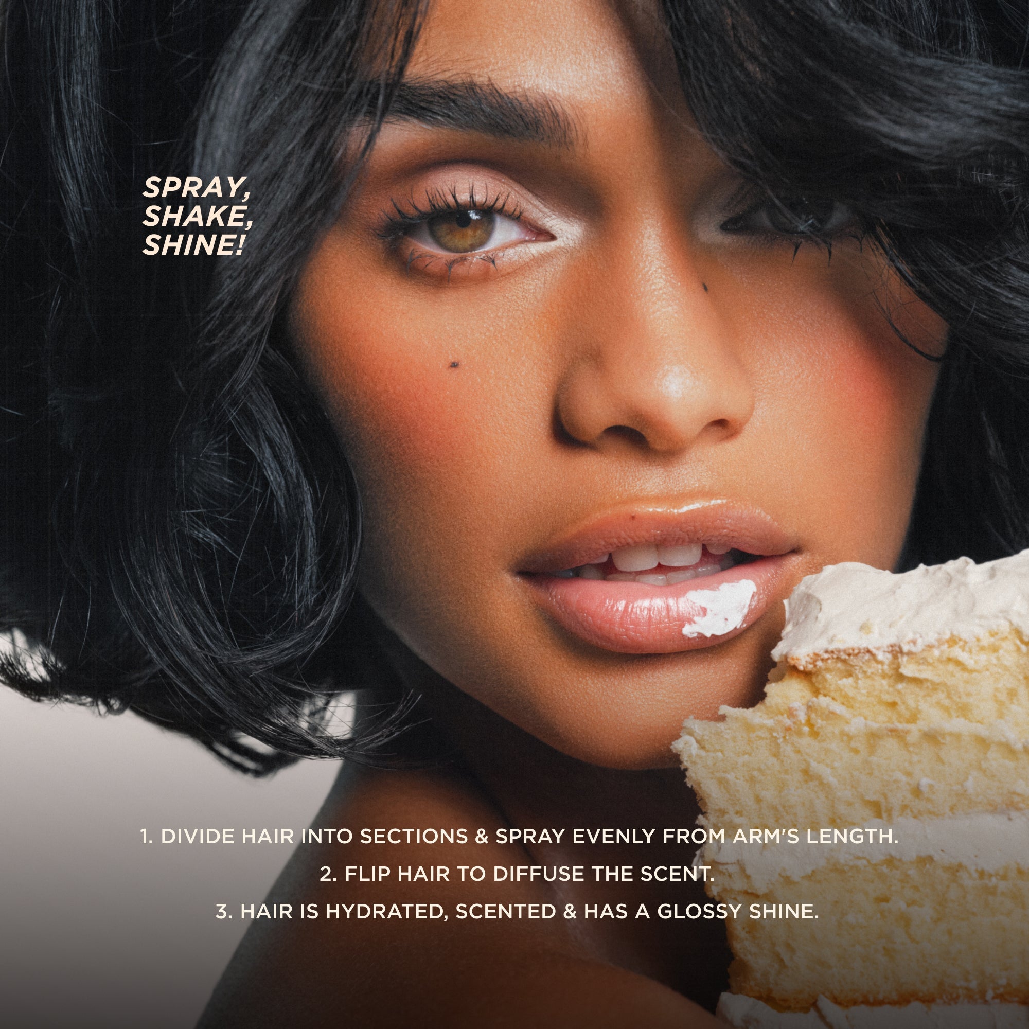 Model with glossy hair and lips holding cake, demonstrating spray application for shine and fragrance.