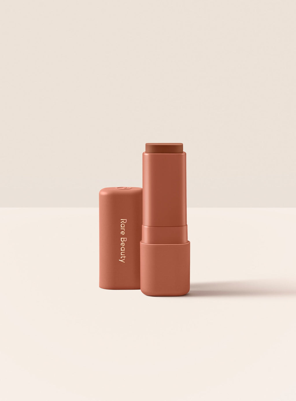 Friendly| Rare Beauty Find Comfort Lip Butter in shade Friendly, a muted caramel color 