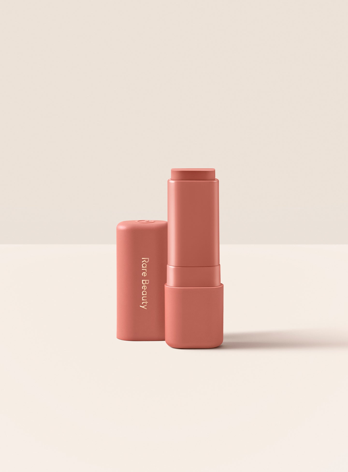 Loved| Rare Beauty's Find Comfort Lip Butter in shade Loved, a soft tea rose pink shade 