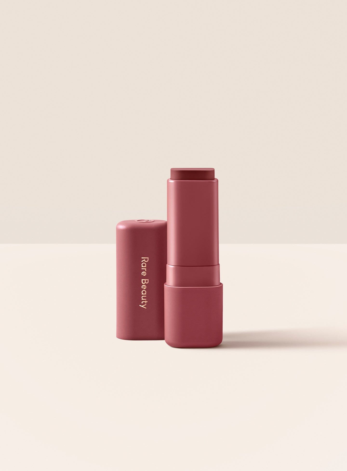 Uplifting| Rare Beauty Find Comfort Lip Butter in shade Uplifting, a deep cool berry color