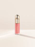 Bliss| Rare Beauty's Soft Pinch Liquid Blush in the matte nude pink shade "Bliss."