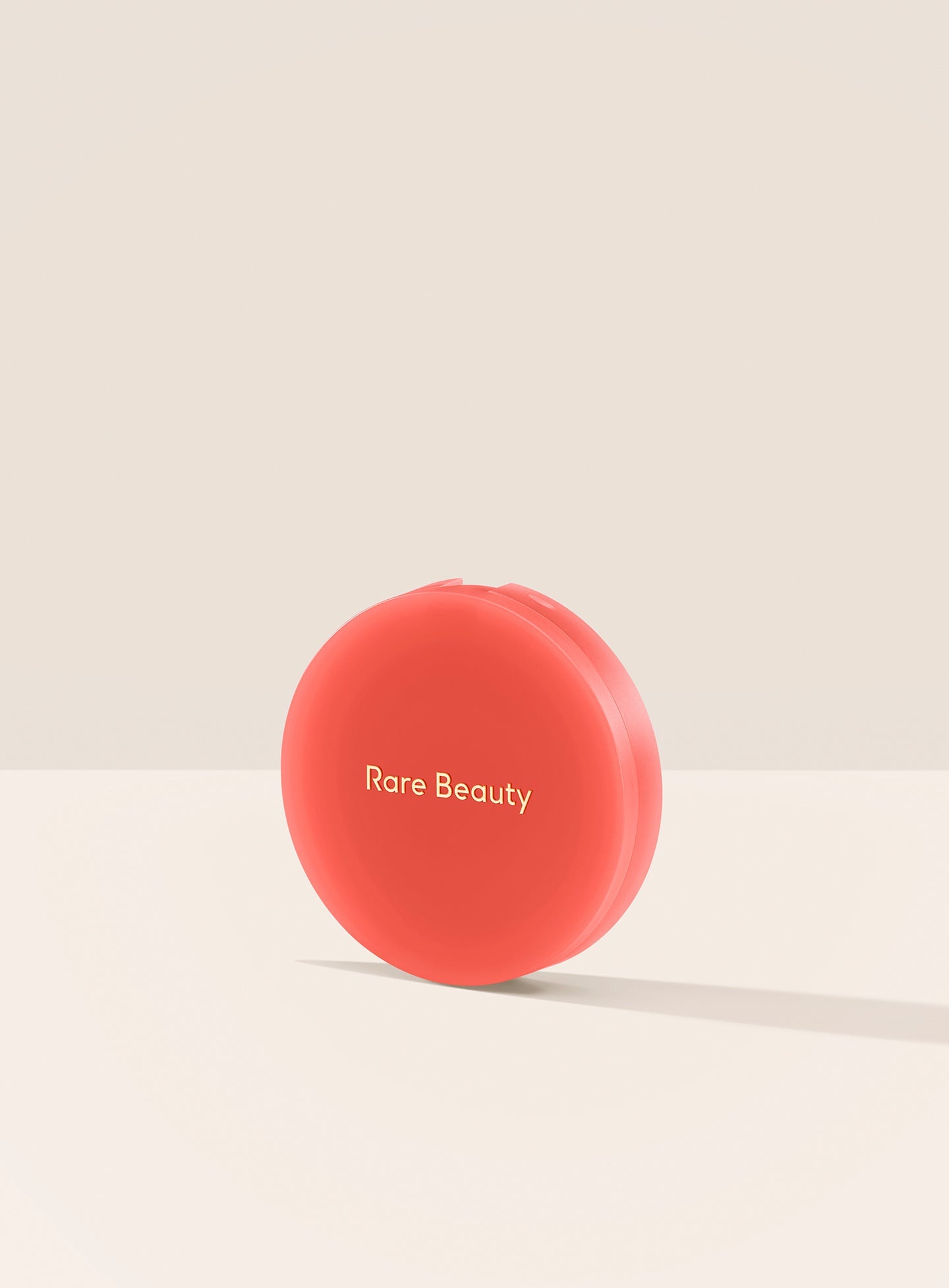 Alive| A closed container of Rare Beauty's Soft Pinch Matte Bouncy Blush in the shade Alive.