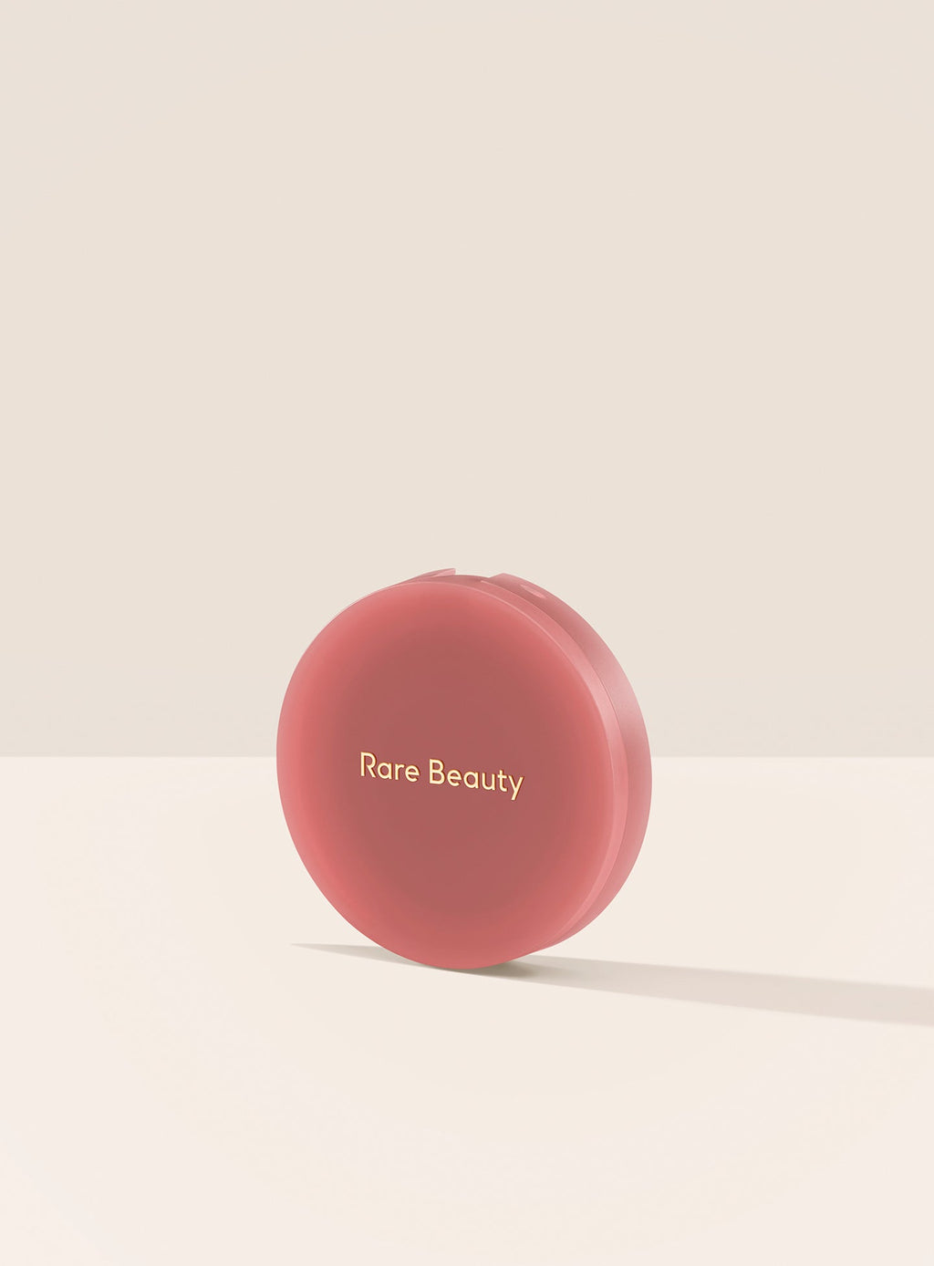 Hope| A closed container of Rare Beauty's Soft Pinch Matte Bouncy Blush in the shade Hope.