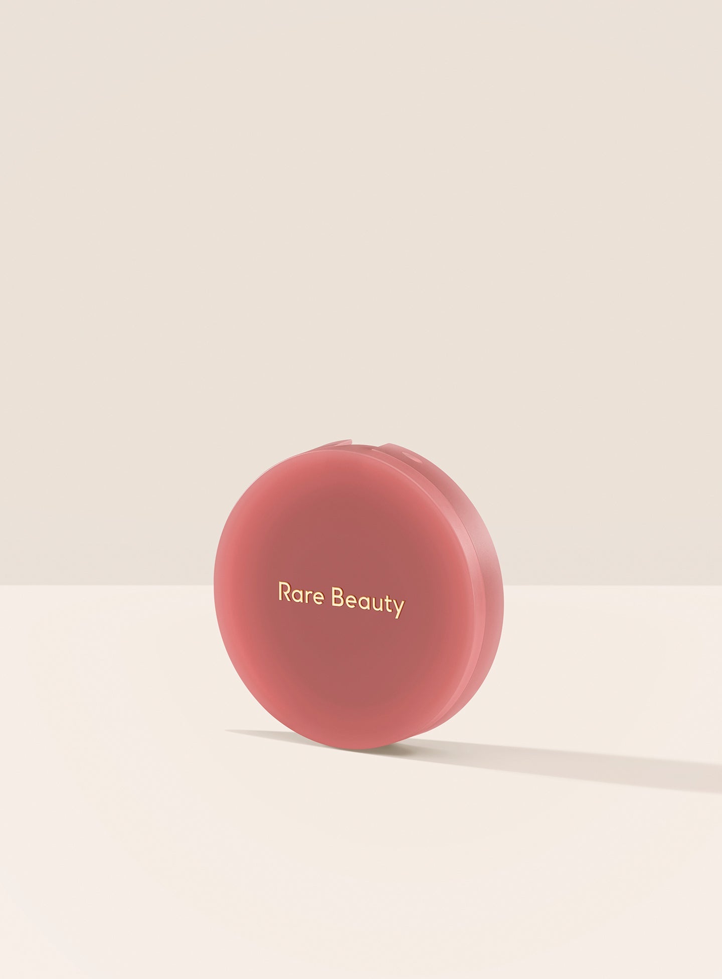 Hope| A closed container of Rare Beauty's Soft Pinch Matte Bouncy Blush in the shade Hope.