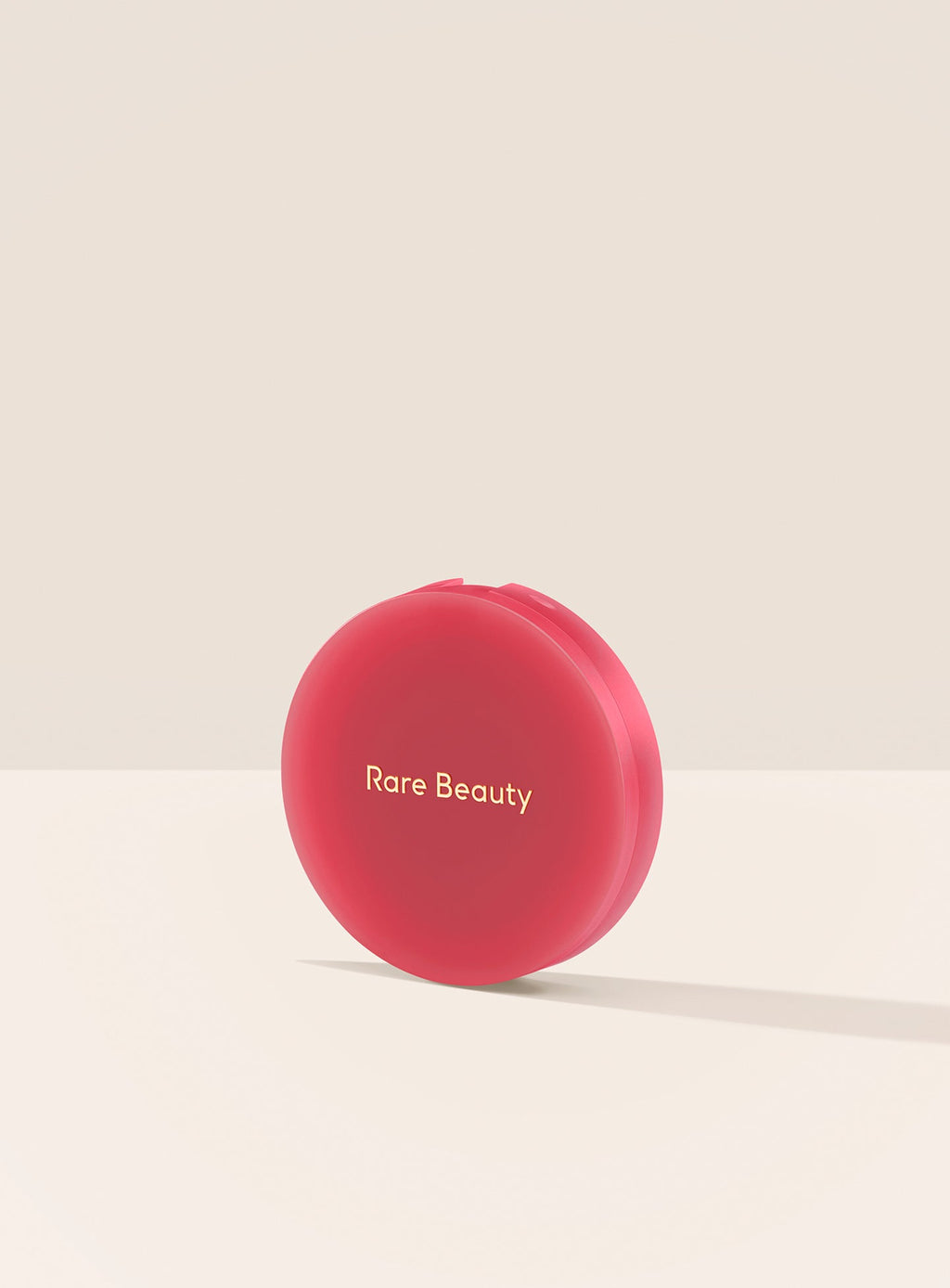 Thriving| A closed container of Rare Beauty's Soft Pinch Matte Bouncy Blush in the shade Thriving.