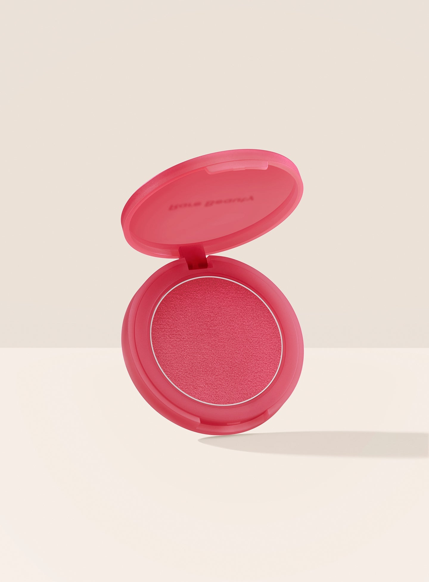 Thriving| Rare Beauty's Soft Pinch Matte Bouncy Blush in the bright raspberry shade Thriving.