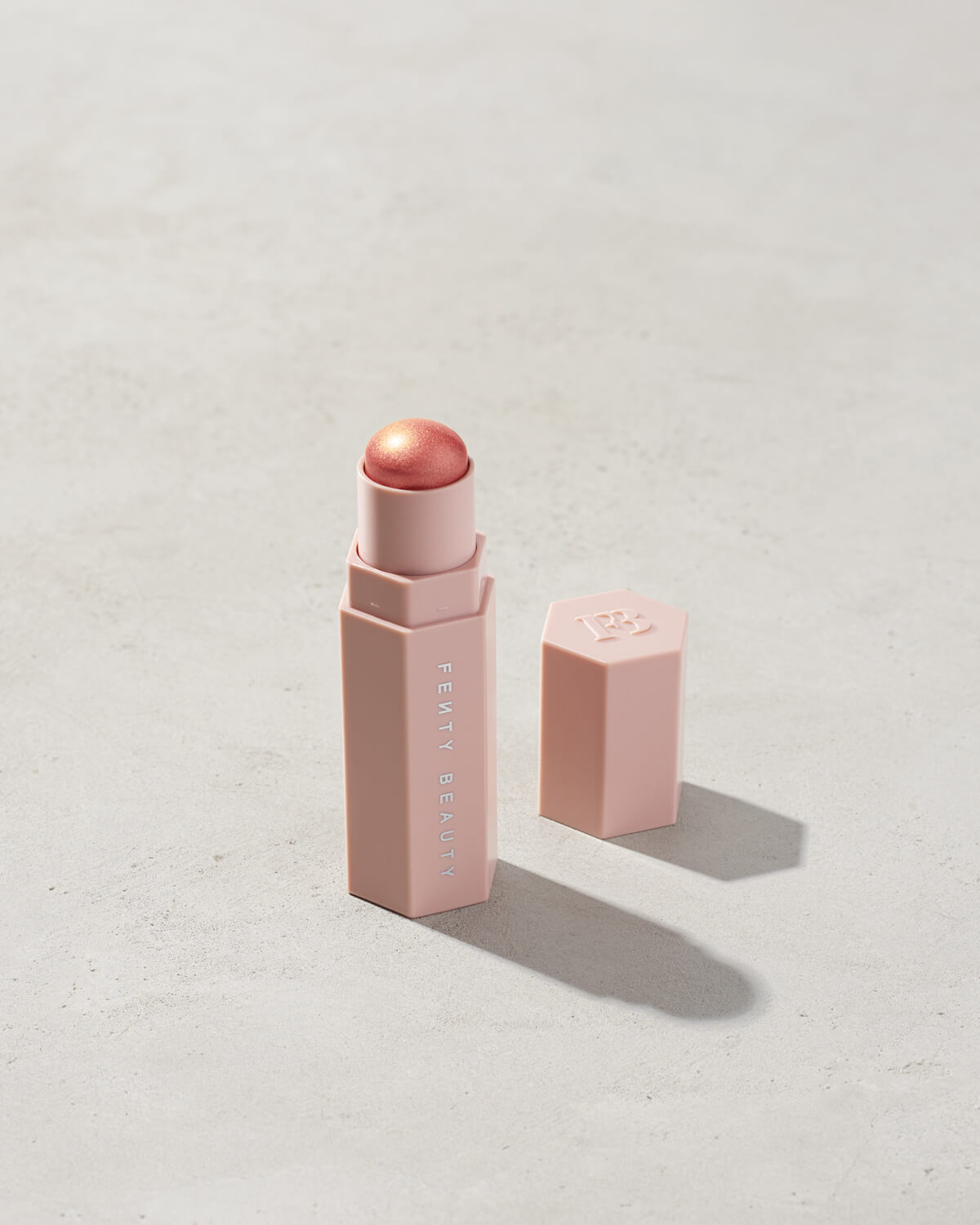 Match Stix Shimmer Skinstick shown in shade Yacht Lyfe on a concrete background. 