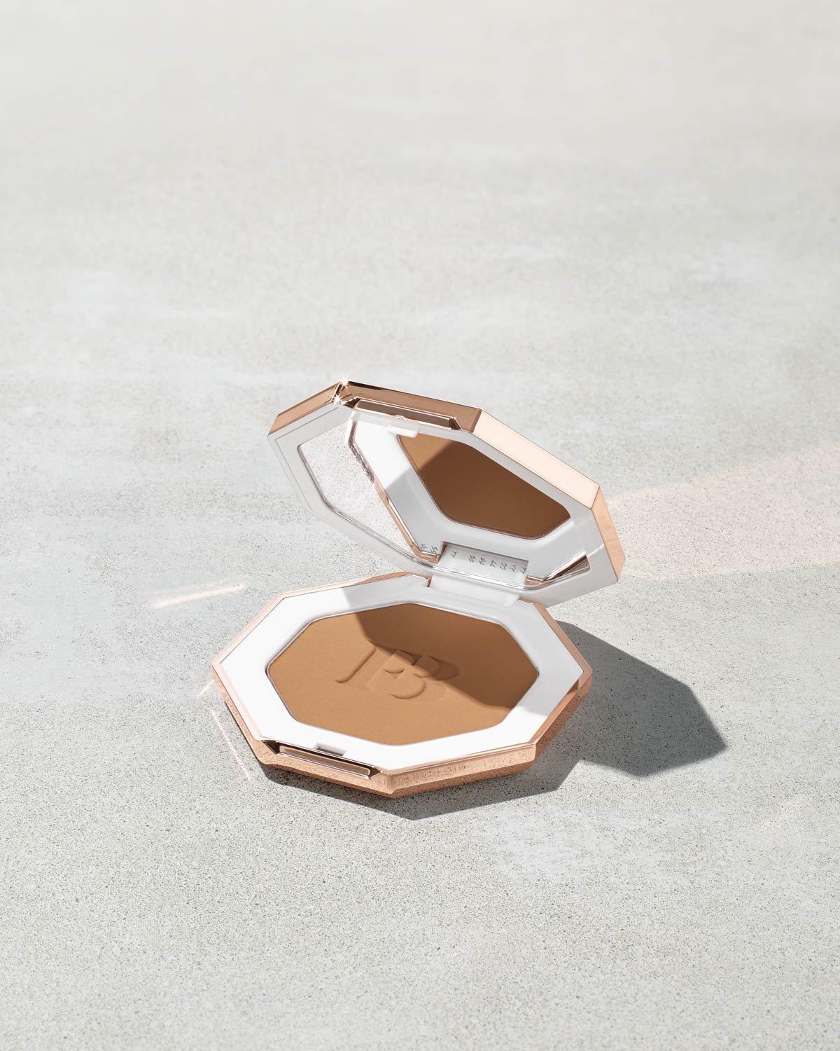 Sun Stalk'r Instant Warmth Bronzer shown in shade Bajan Gyal