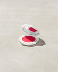 Cheeks Out Freestyle Cream Blush shown in shade Strawberry Drip