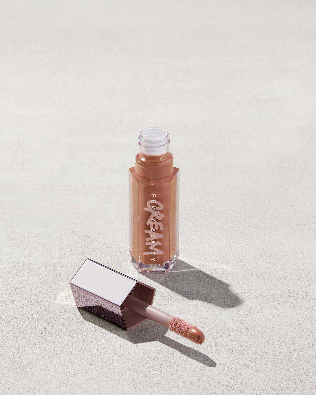 Gloss Bomb Cream open shown in shade Honey Waffles