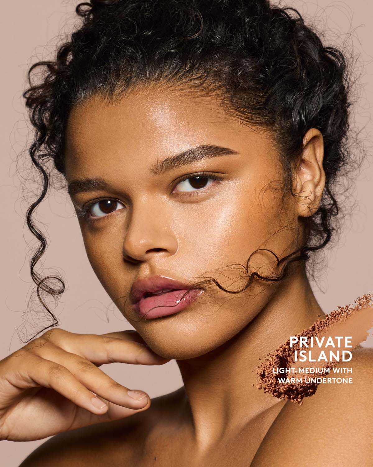 Light-Medium skin tone model wearing sun stalk'r bronzer in shade Private Island.