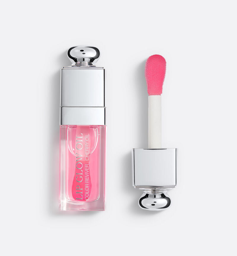 Addict lip glow oil, hydrating treatment, 6ml. Image 1 of 3, featuring the product packaging.
