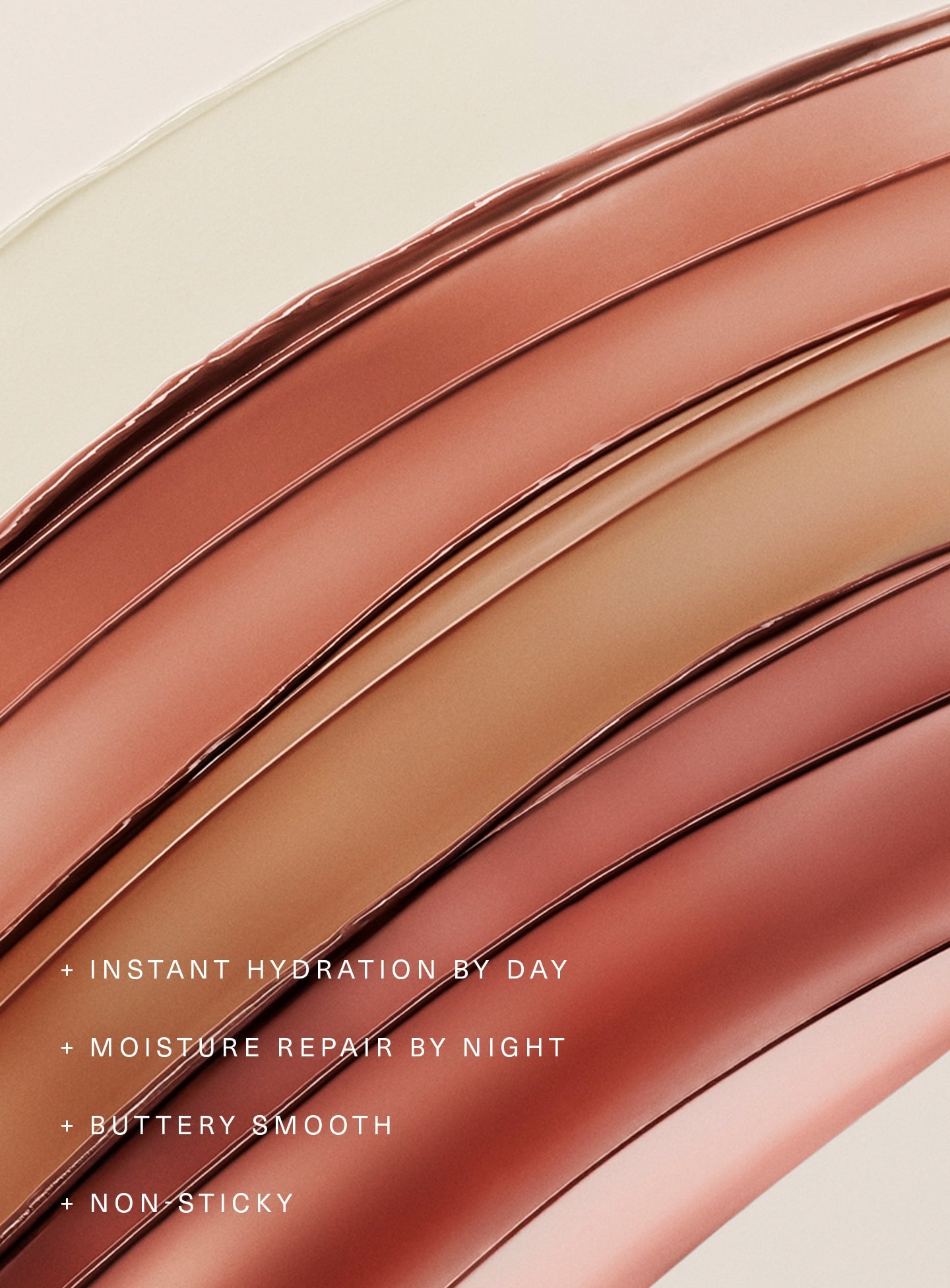 Swatches of all Rare Beauty Find Comfort Lip Butter shades in Uplifting (deep cool berry), Friendly (muted caramel), Loved (dusty rose), and Easygoing (clear)