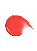 Grateful| A swatch of Rare Beauty's Soft Pinch Liquid Blush in the true red shade "Grateful."