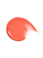 Joy| A swatch of Rare Beauty's Soft Pinch Liquid Blush in the muted peach shade "Joy."