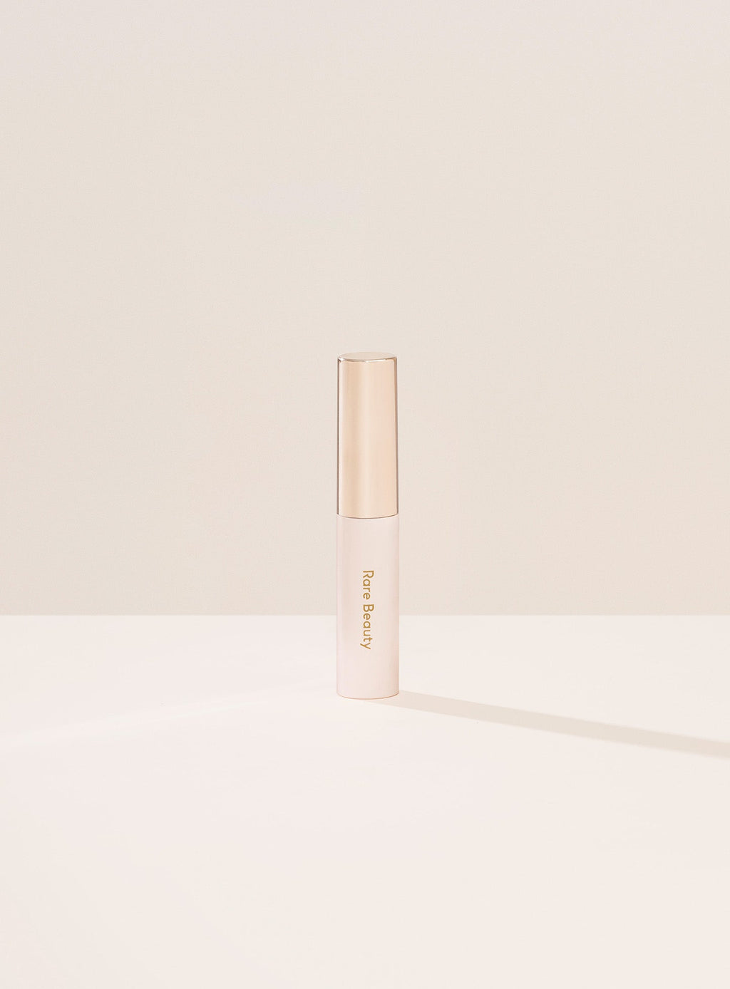 Clear| Minimalistic image of Rare Beauty's Brow Harmony Flexible Lifting Gel packaging.