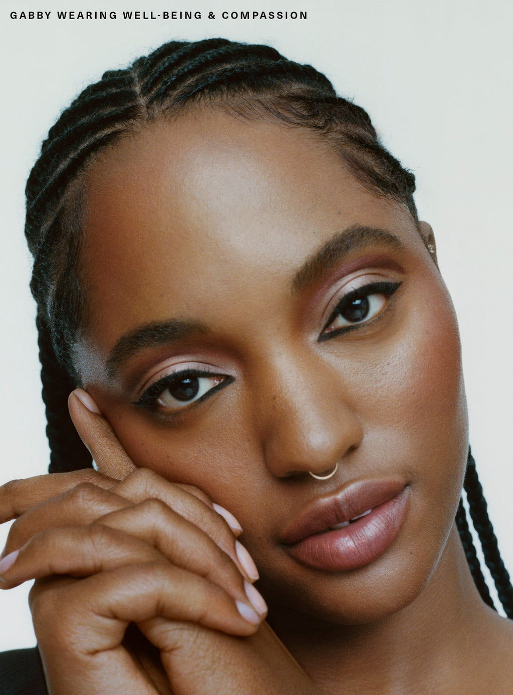 Well-Being| Model Gabby wearing All of the Above Weightless Eyeshadow Stick in shade "Well-Being" and "Compassion".