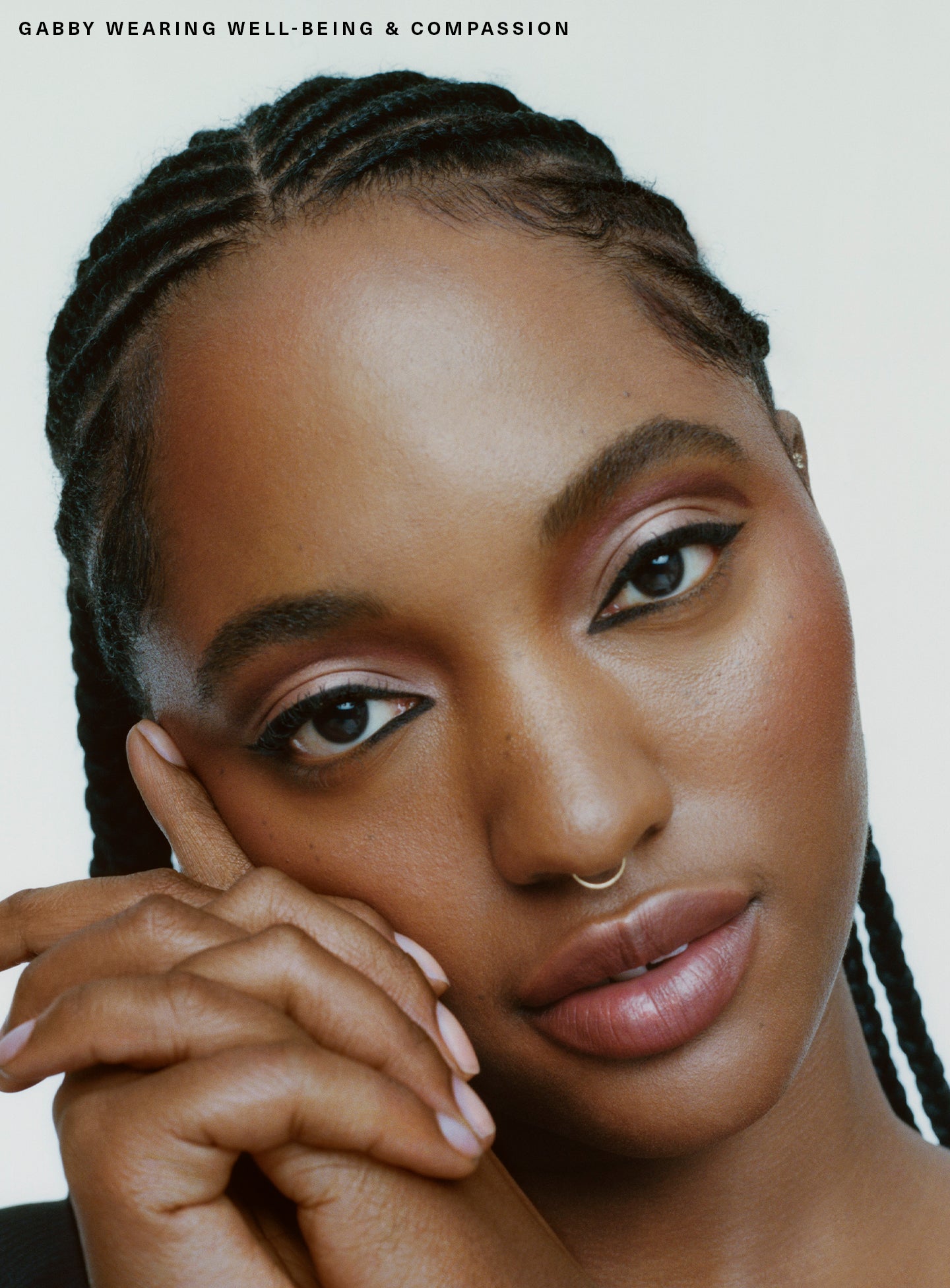 Well-Being| Model Gabby wearing All of the Above Weightless Eyeshadow Stick in shade "Well-Being" and "Compassion".