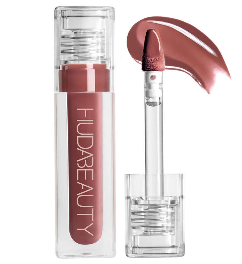 Faux Filler Plumping Lip Gloss, high shine, hydrating, clear, full lips. Image 1 of 12.