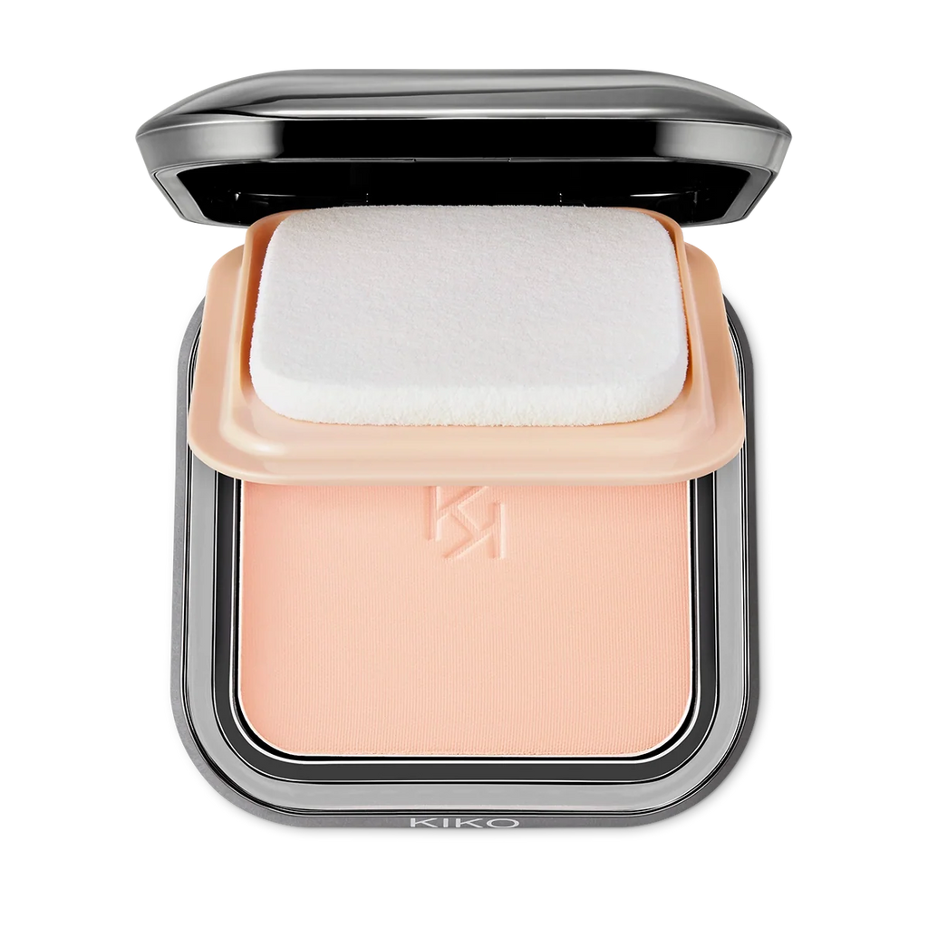 Weightless powder foundation swatch on skin, flawless matte finish. Product image 3 of 33.