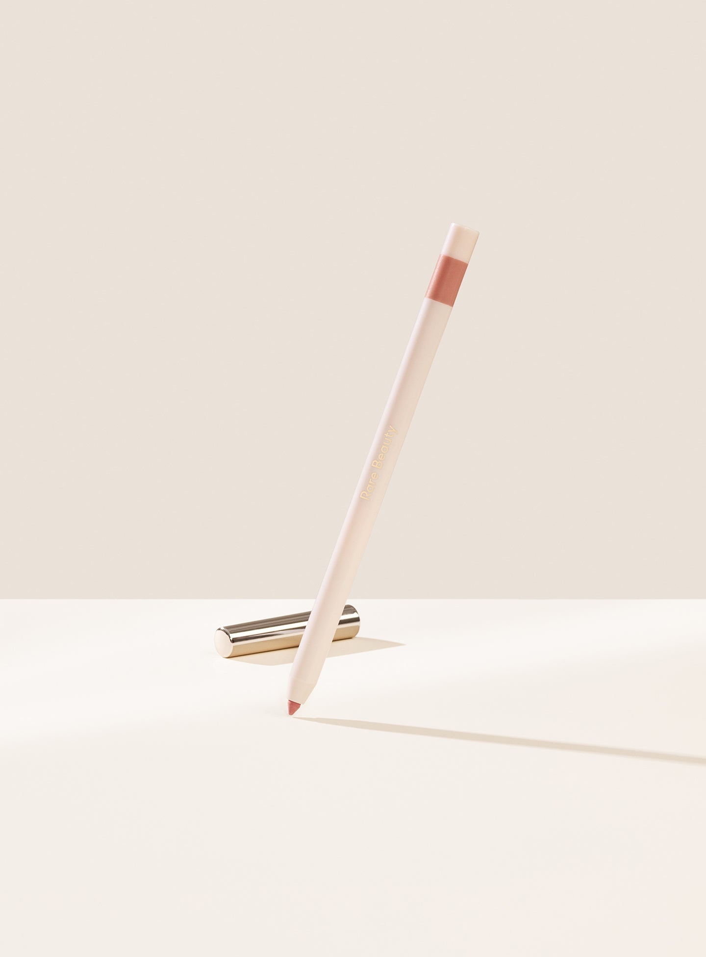Creative| Rare Beauty's Kind Words Matte Lip Liner, a creamy waterproof lip liner in the shade Creative.