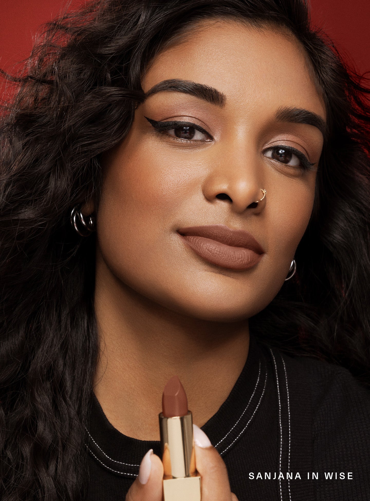 Wise| Model Sanjana wearing Rare Beauty's Kind Words Matte Lipstick in shade "Wise". 