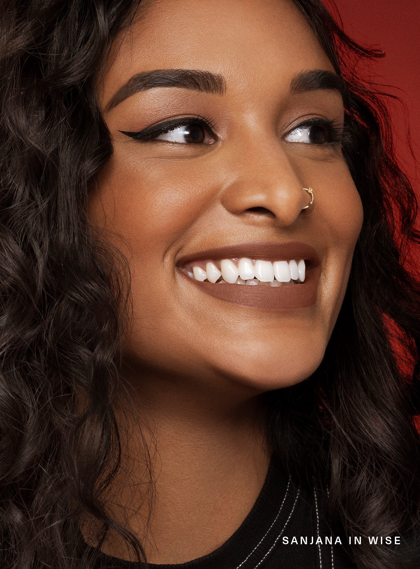 Wise| Model Sanjana wearing Rare Beauty's Kind Words Matte Lipstick in shade "Wise". 