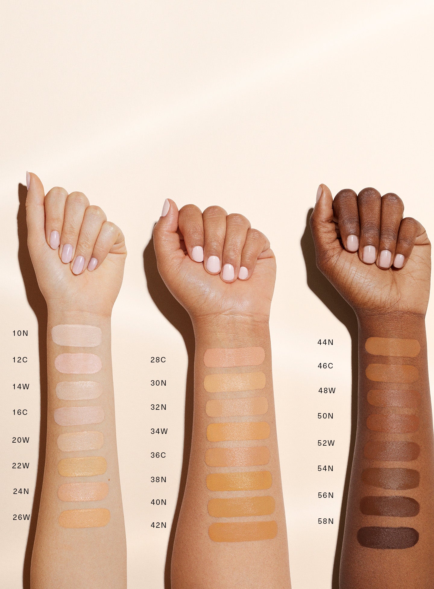 | Shade swatches on different skin tones of Rare Beauty's Positive Light Tinted Moisturizer with SPF.