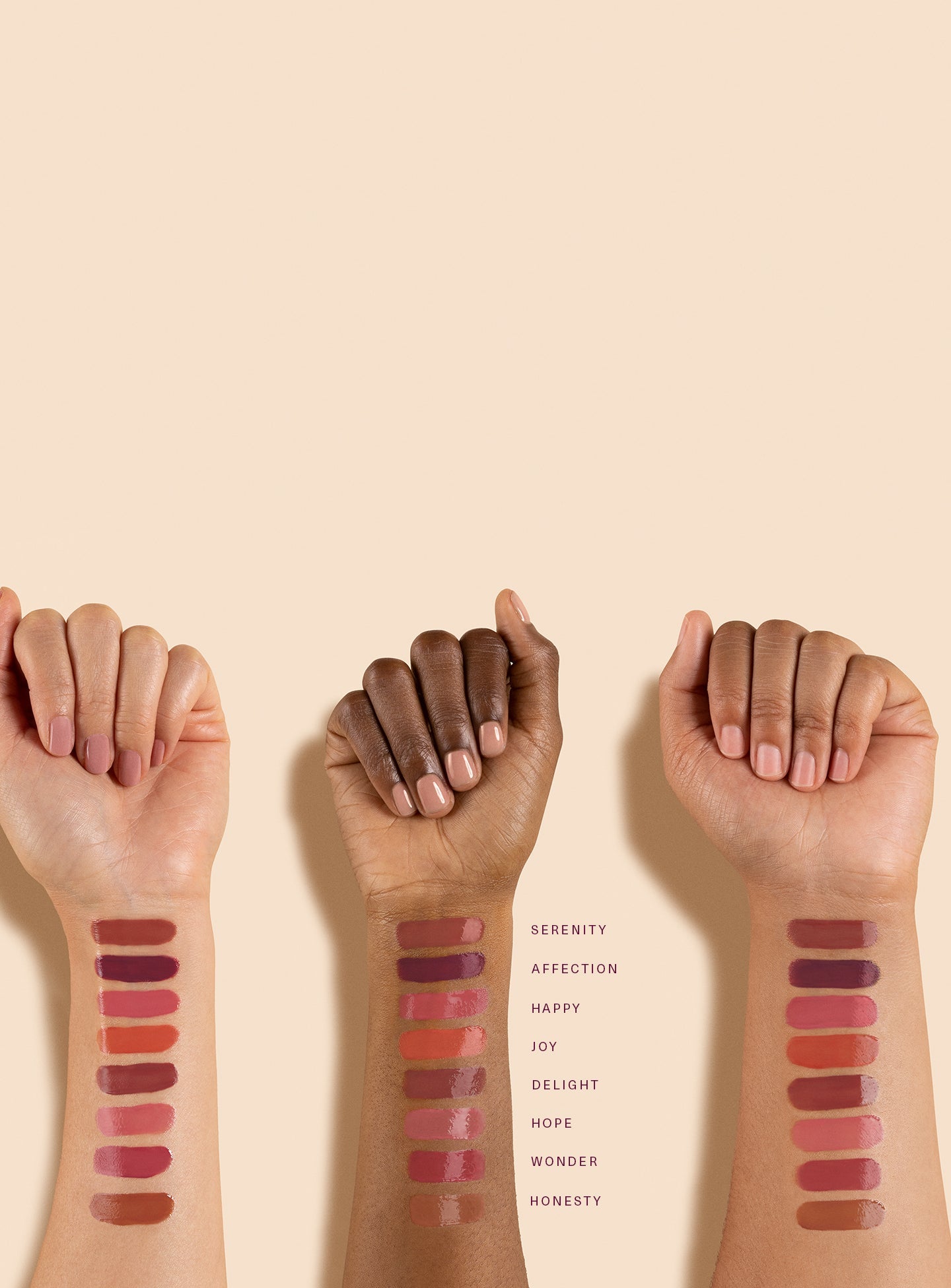 Three models with varying skin tones display swatches of the soft pinch tinted lip oil in eight different shades available
